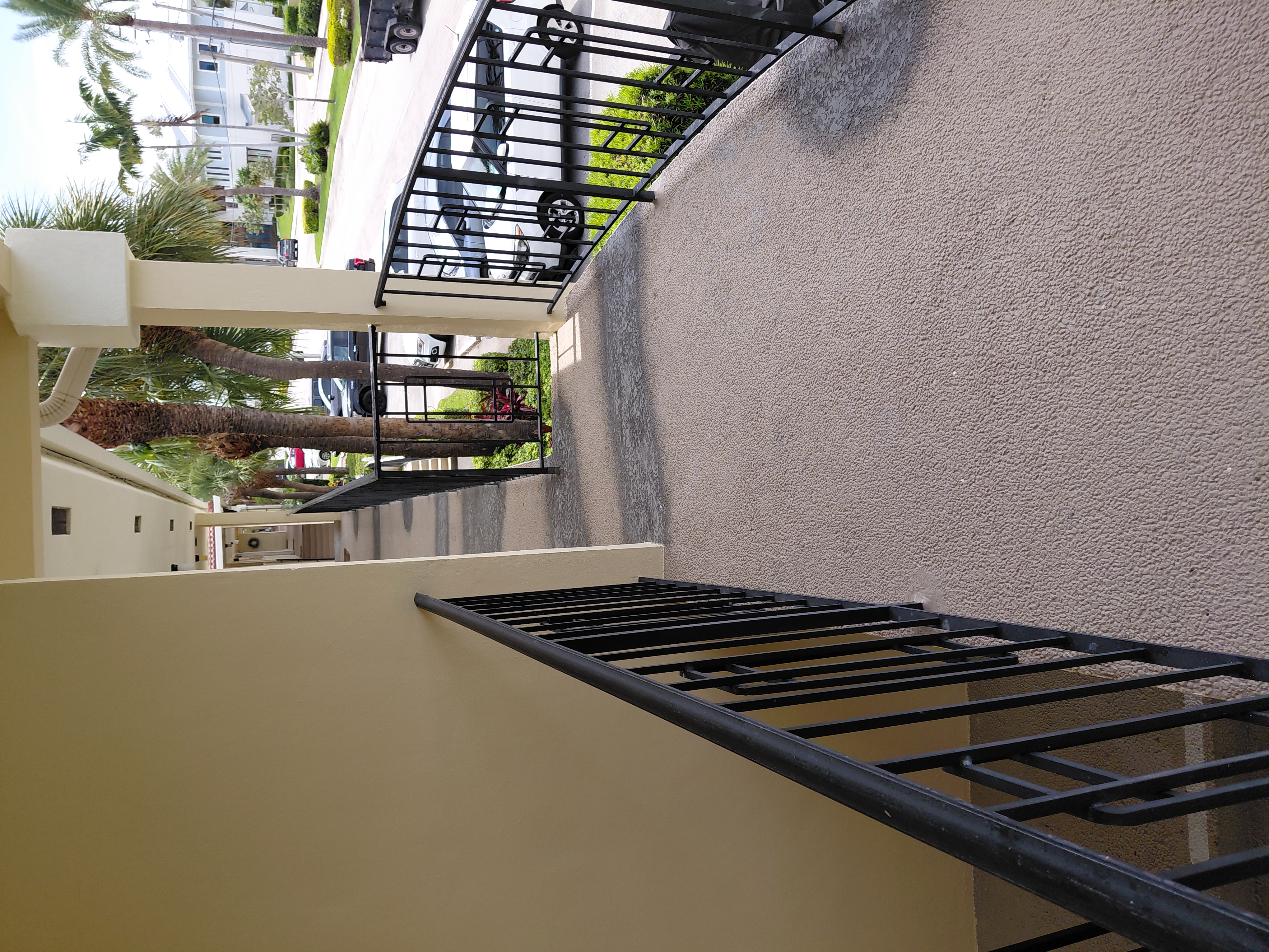 Balcony walkway, deck, fence, and exterior metal coating work by Watsons Painting