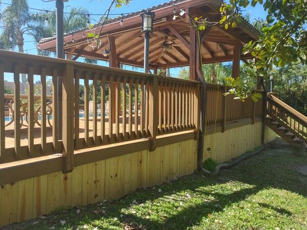 Deck staining and fence painting in Deerfield Beach FL