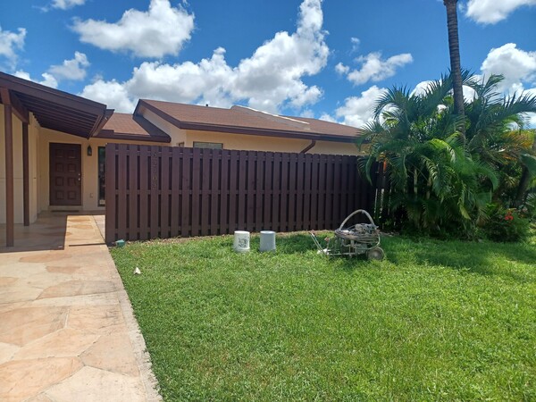 Two-story exterior painting in Weston FL